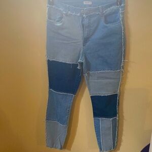 Slightly worn women’s size 16 patch work stretch skinny leg jeans